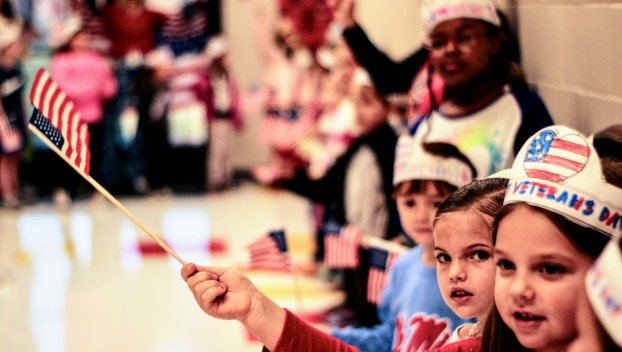 Lafayette Elementary honors military service with an indoor Veterans Day parade, shifting from outdoor plans due to rain, engaging students.